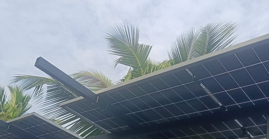 Elevated solar canopy installed by Soltech Power Solutions at Kulathoor, Trivandrum